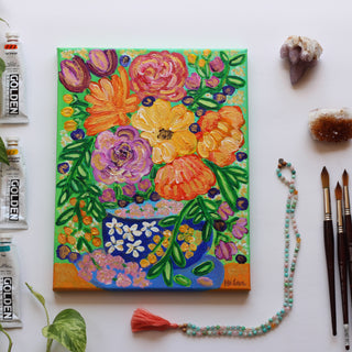 vibrant and colorful flower paintings in a tea pot